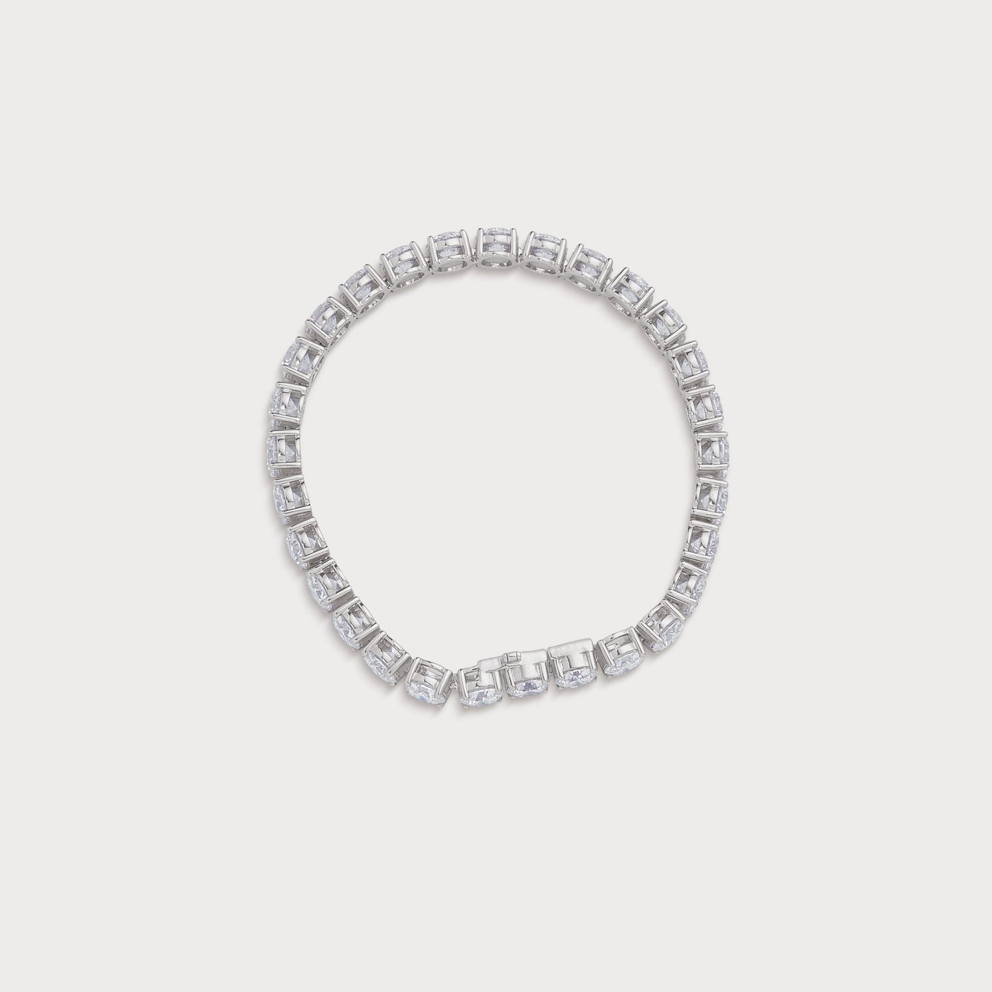 The Regal Tennis Bracelet, an exquisite white gold diamond tennis bracelet with brilliant round diamonds, perfect for luxury fine jewelry lovers. Shop now at our diamond jewelry ecommerce store.