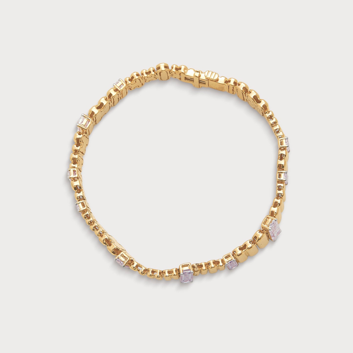 The Echoes of Choice gold diamond bracelet featuring fancy-cut diamonds for women. A luxurious piece of diamond jewelry.