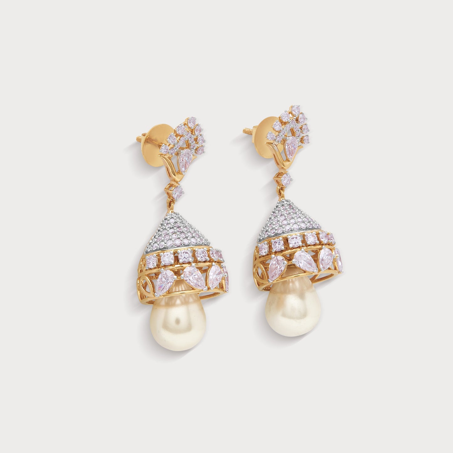 Chandini Jhumkas: Gold and diamond jhumka earrings with pearl drops. Elegant traditional Indian diamond jewelry for women.