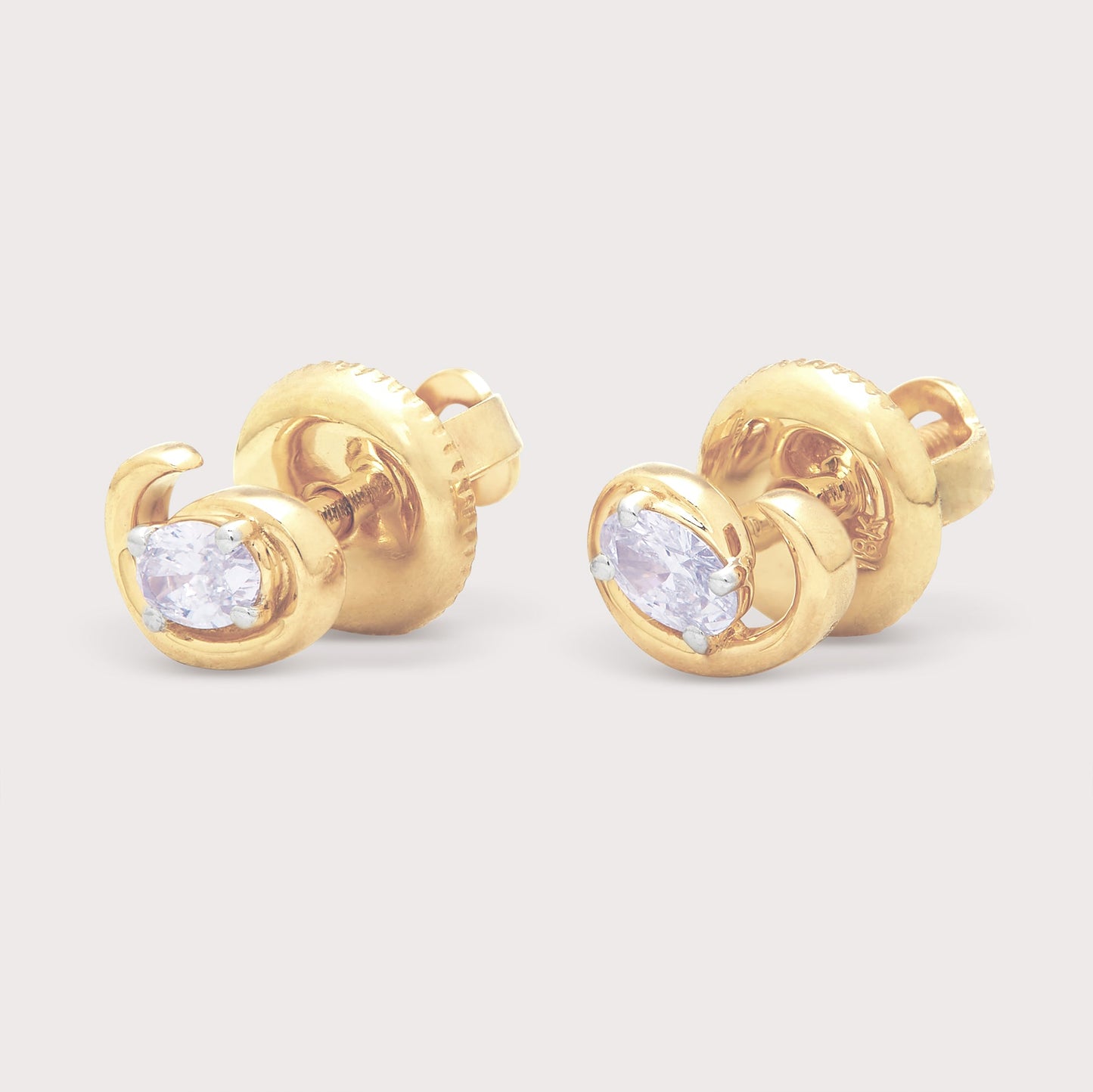 The Oval Swirl Studs