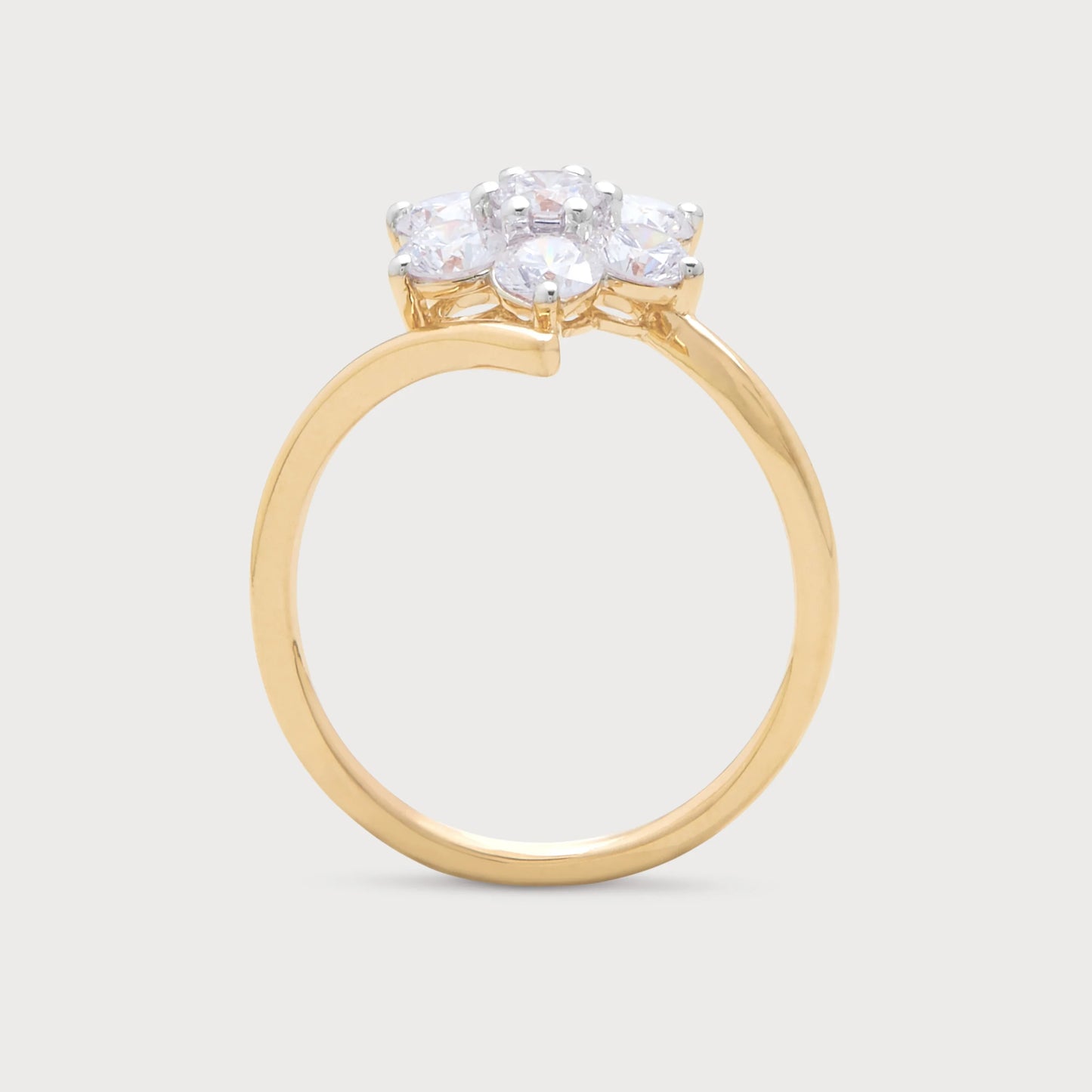 The Solara Ring: An elegant yellow gold diamond cluster ring featuring five brilliant-cut diamonds, perfect for engagements or as a luxury diamond jewelry piece.