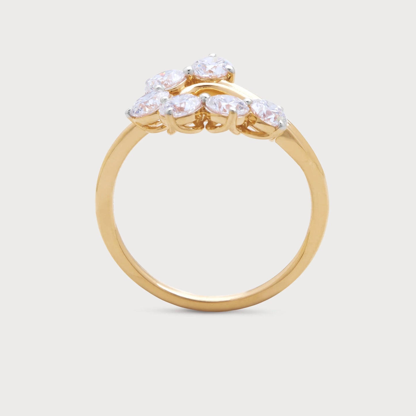 The Althea Ring: Luxurious gold ring featuring multiple sparkling diamonds in a modern cluster design, perfect for engagements or special occasions.