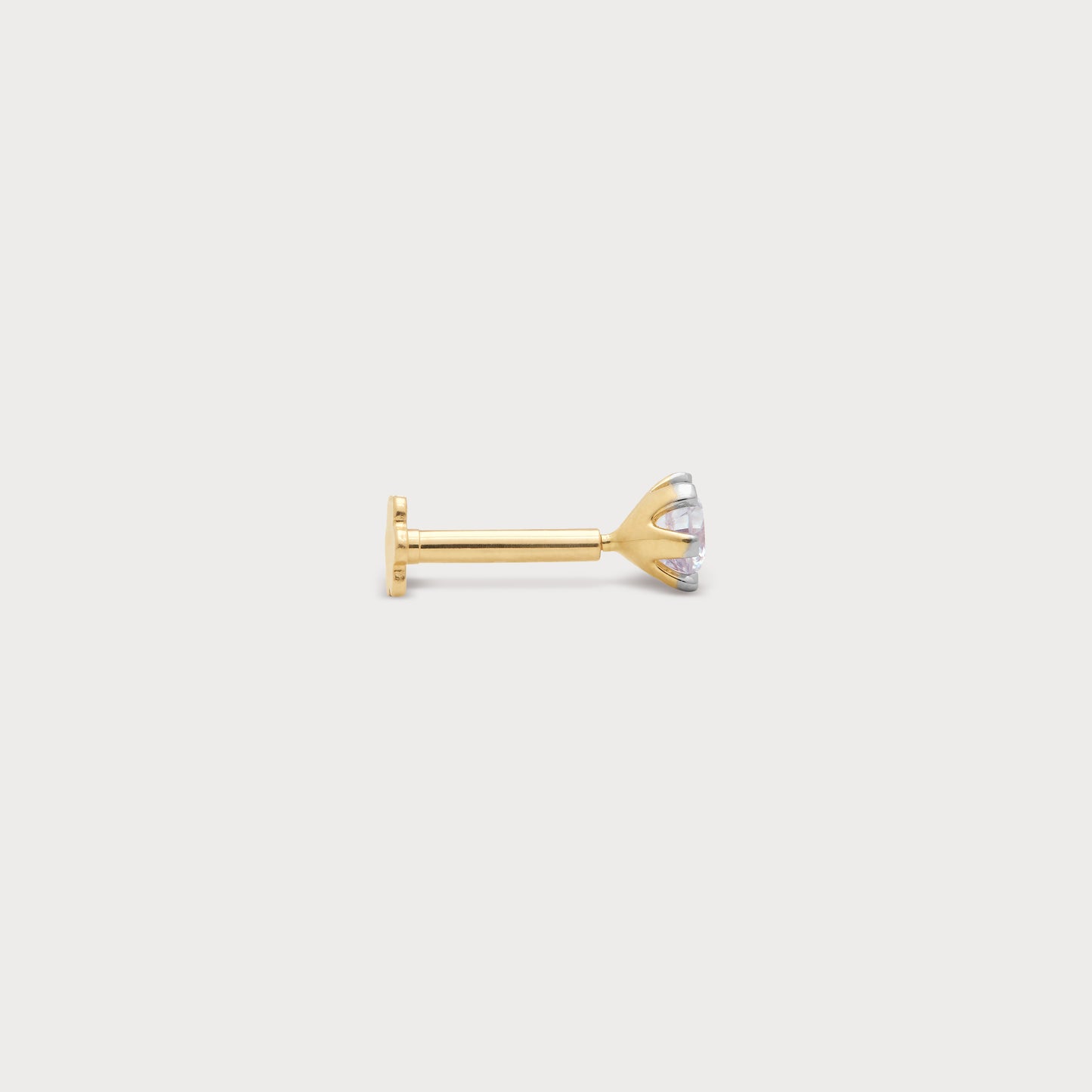 Elegant gold stud nose pin featuring a sparkling diamond, perfect for diamond jewelry collections and everyday wear.