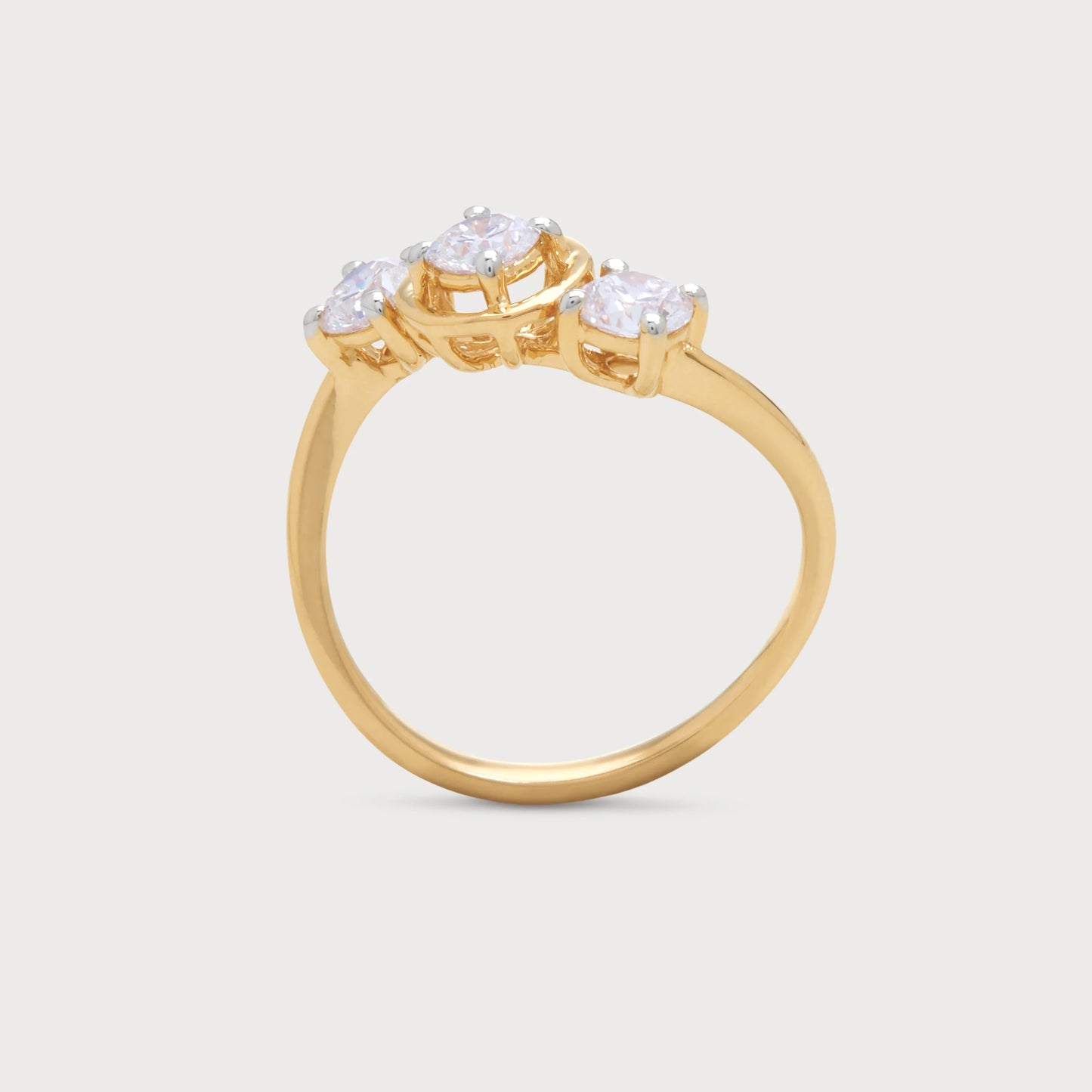 The Alina Ring - Three stone diamond ring with a gold band. Elegant diamond engagement ring or fine jewelry piece.