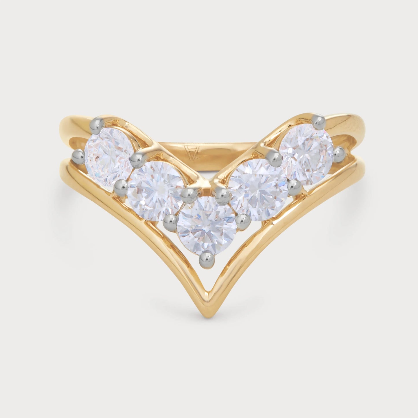 The Avienne Ring: Elegant V-shaped yellow gold ring with five round brilliant diamonds, perfect as a wedding band, engagement ring, or stacking ring. Luxury diamond jewellery.
