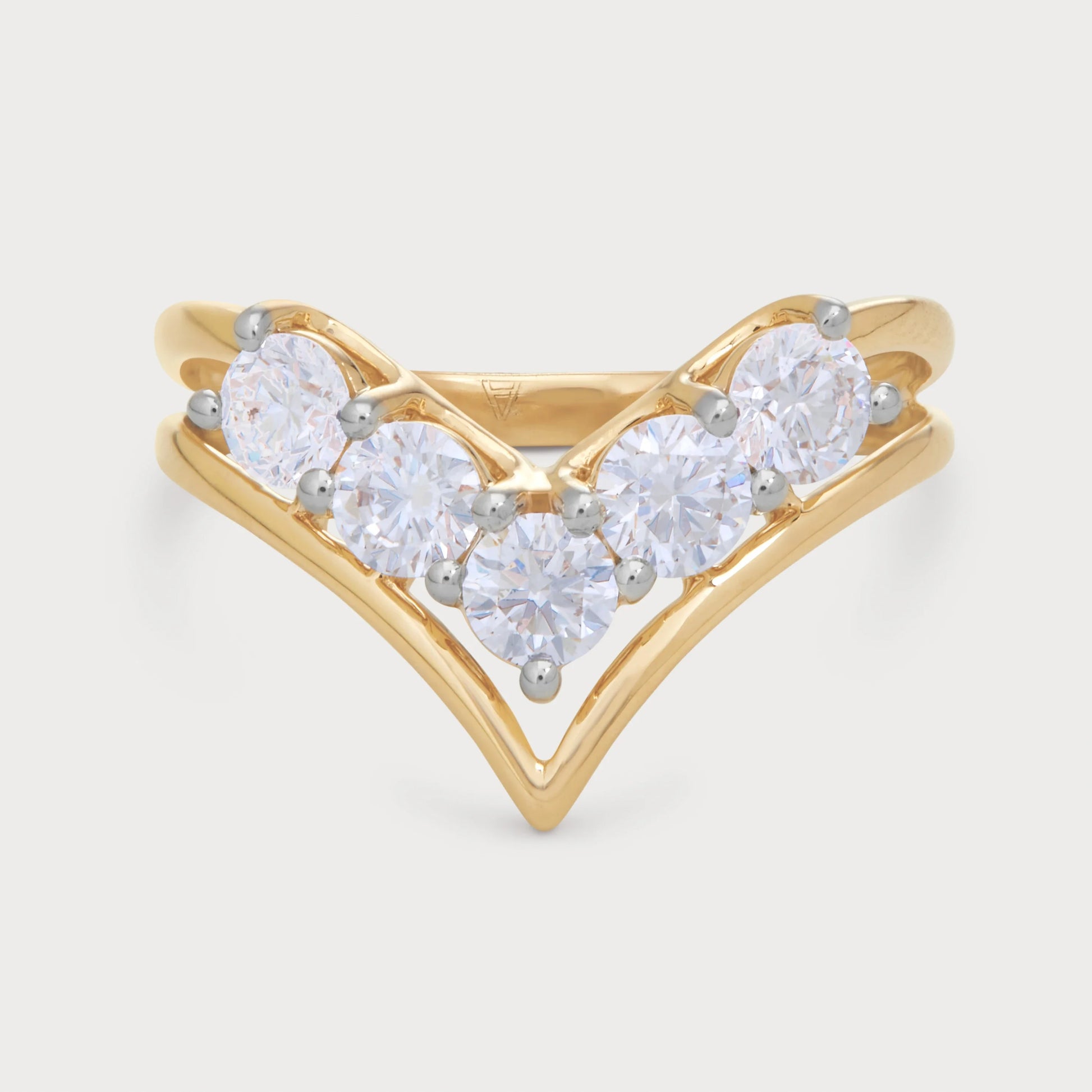 The Avienne Ring: Elegant V-shaped yellow gold ring with five round brilliant diamonds, perfect as a wedding band, engagement ring, or stacking ring. Luxury diamond jewellery.