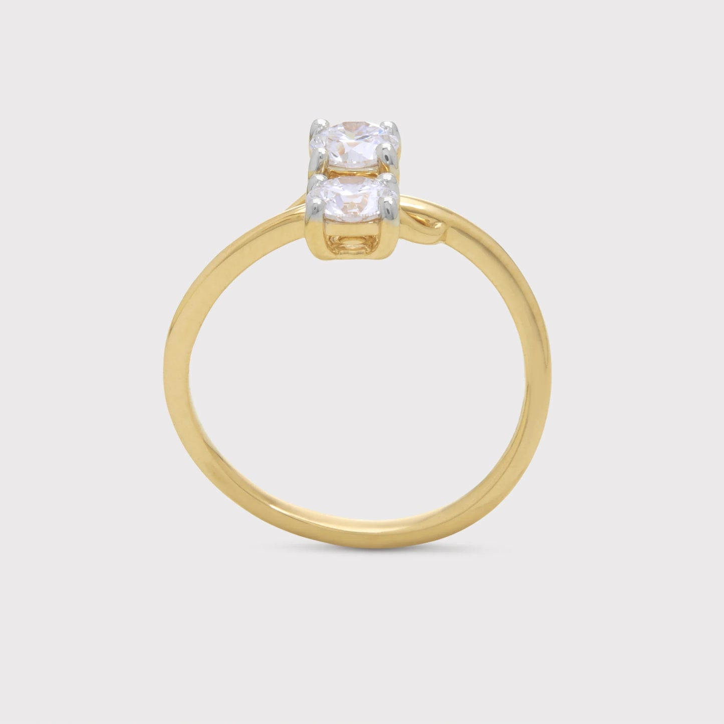 The Anedra Ring: a two-stone diamond gold ring for elegant everyday wear or special occasions, perfect for engagements or anniversaries.
