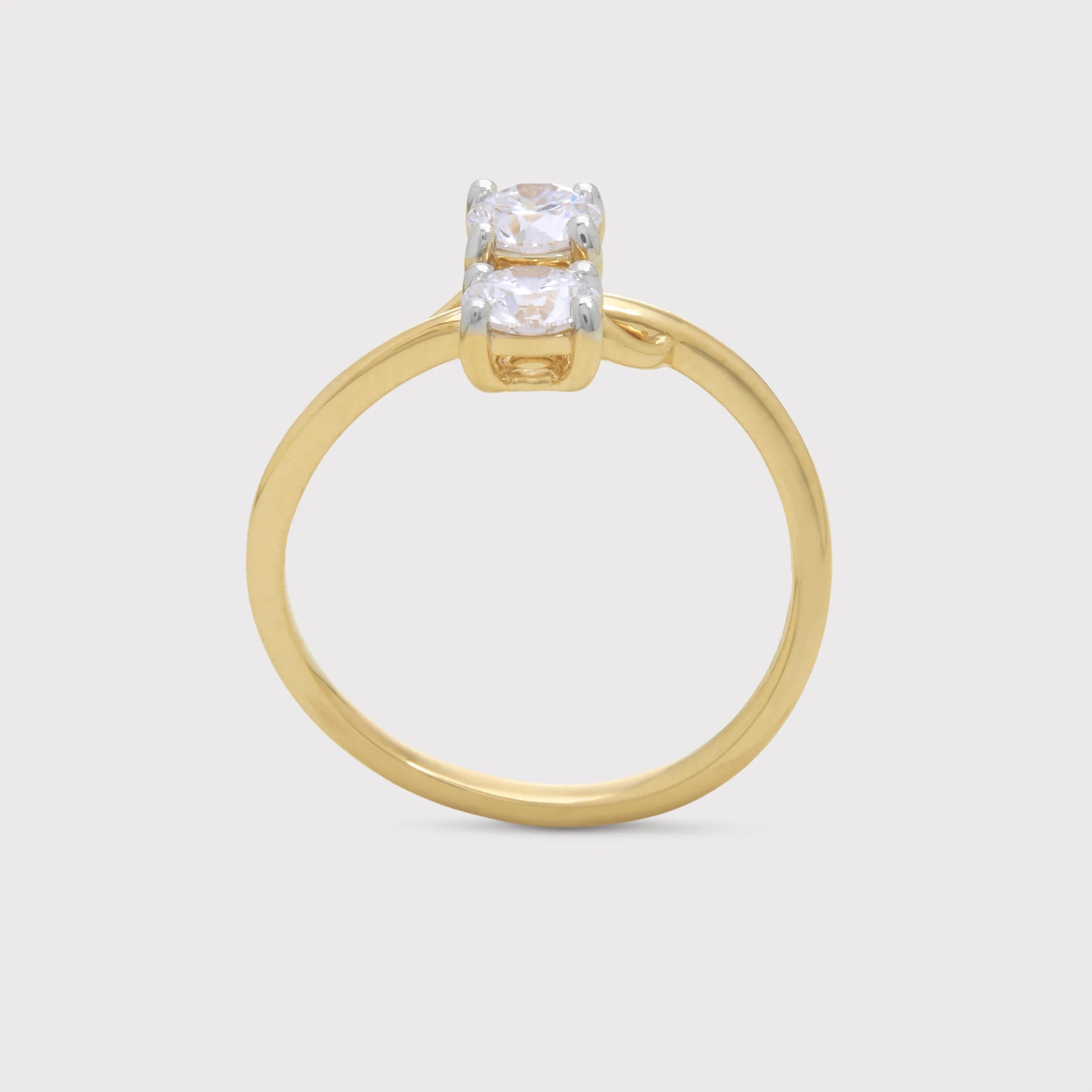 The Anedra Ring: a two-stone diamond gold ring for elegant everyday wear or special occasions, perfect for engagements or anniversaries.