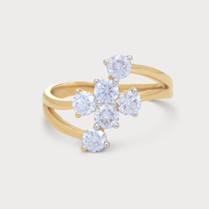 The Asteris Ring, a stunning yellow gold bypass ring featuring a brilliant cluster of round diamonds, perfect for women's fine diamond jewelry.