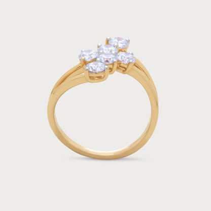The Asteris Ring: Yellow gold cluster ring with multiple round brilliant diamonds.