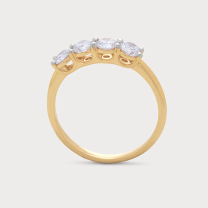 The Zaya Ring, a yellow gold four-stone diamond ring with brilliant round diamonds, perfect for engagement or anniversary, from a fine jewelry ecommerce store.