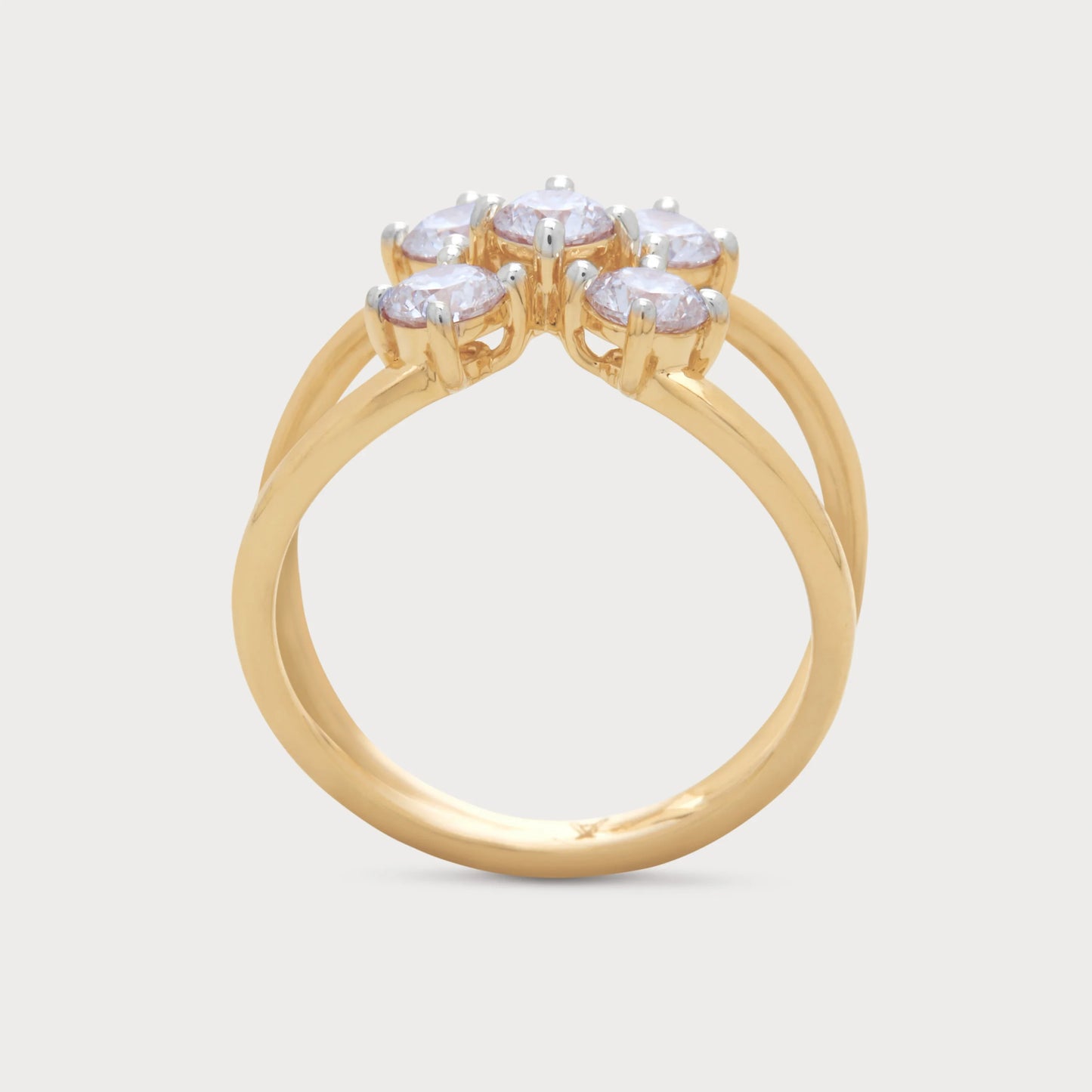 The Calyx Ring: Elegant gold diamond ring with a floral cluster setting.