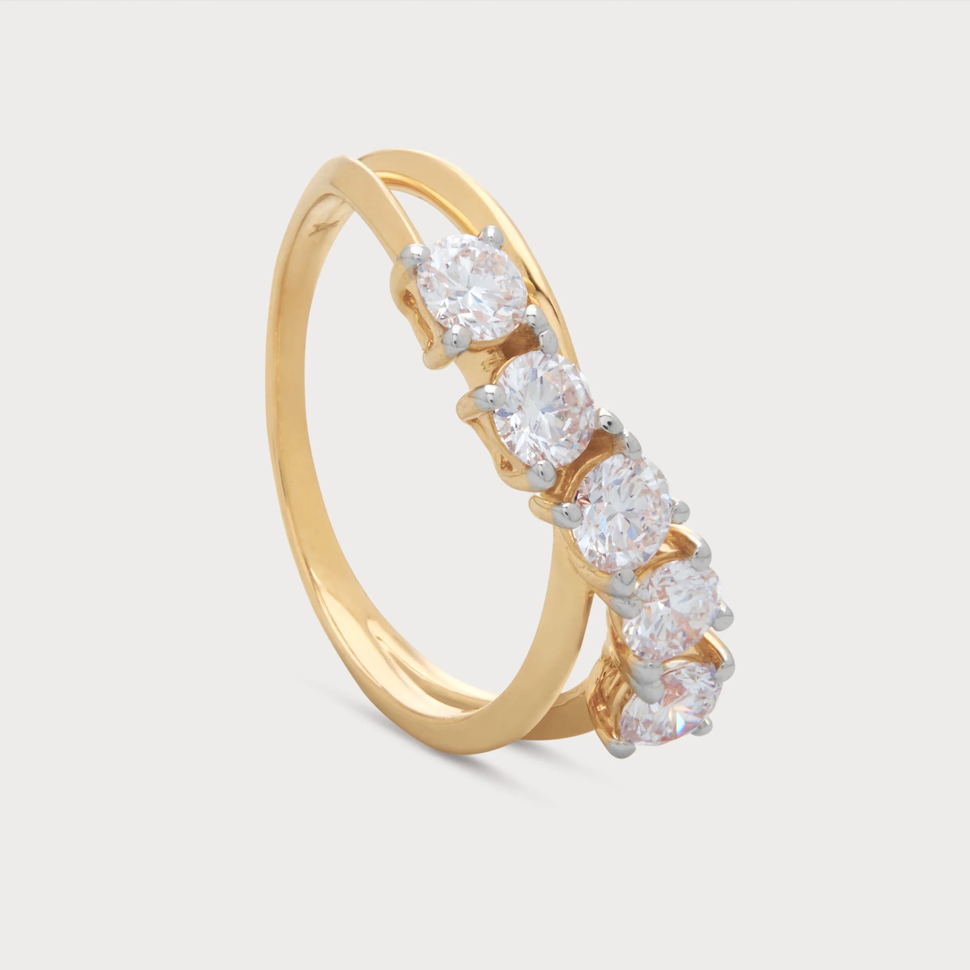 The Alouette Ring: Gold diamond ring featuring five brilliant round diamonds, perfect for engagement, anniversary, or fine jewelry collections.
