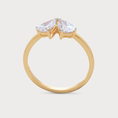 The Zephra Ring, a gold ring featuring two pear-shaped diamonds set side-by-side, perfect for diamond jewelry lovers.