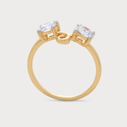 The Caia Ring, an elegant gold ring featuring two round-cut diamonds with a unique intertwined design, ideal for diamond jewelry.