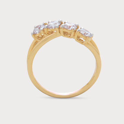 The Arlise Ring: Yellow gold diamond ring with four round brilliant cut diamonds set on a stylish crossover band. Fine diamond jewellery for engagement and anniversary.