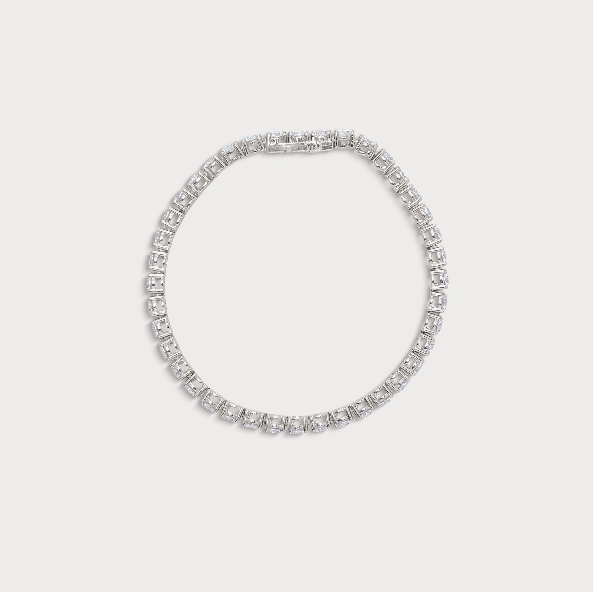 The Grand Tennis Bracelet: Elegant diamond tennis bracelet featuring brilliant-cut diamonds in a secure setting, perfect for luxury diamond jewelry.