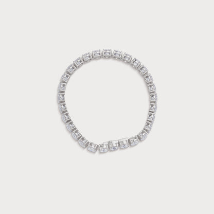 The Regal Tennis Bracelet, an exquisite white gold diamond tennis bracelet with brilliant round diamonds, perfect for luxury fine jewelry lovers. Shop now at our diamond jewelry ecommerce store.