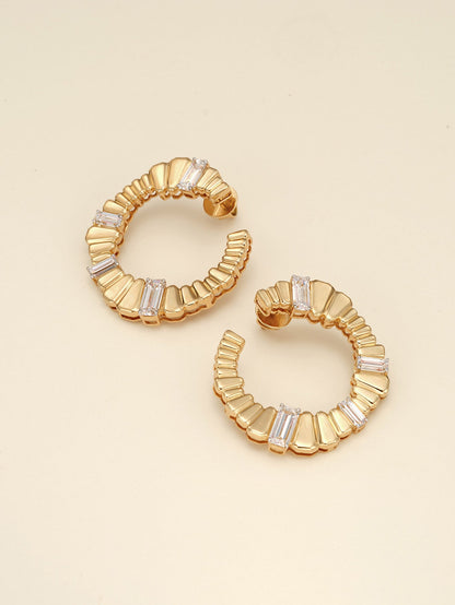 The Echoes of Choice Earrings: Gold hoop earrings with baguette diamonds, diamond jewellery.