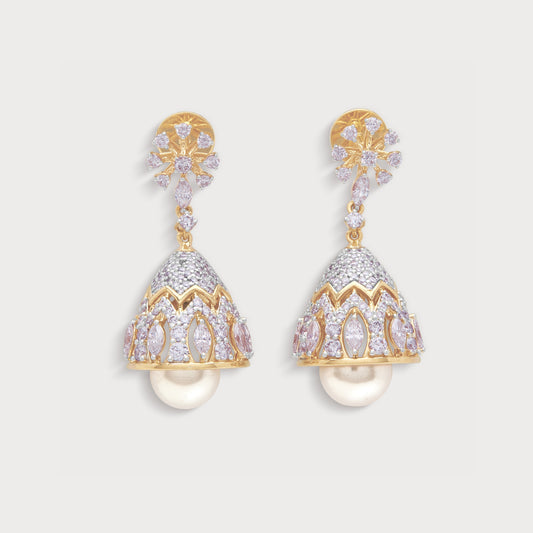 The Flora Diamond Jhumkas, exquisite gold-toned jhumka earrings featuring sparkling clear and pink diamonds with elegant pearl drops, perfect for traditional Indian jewellery lovers.