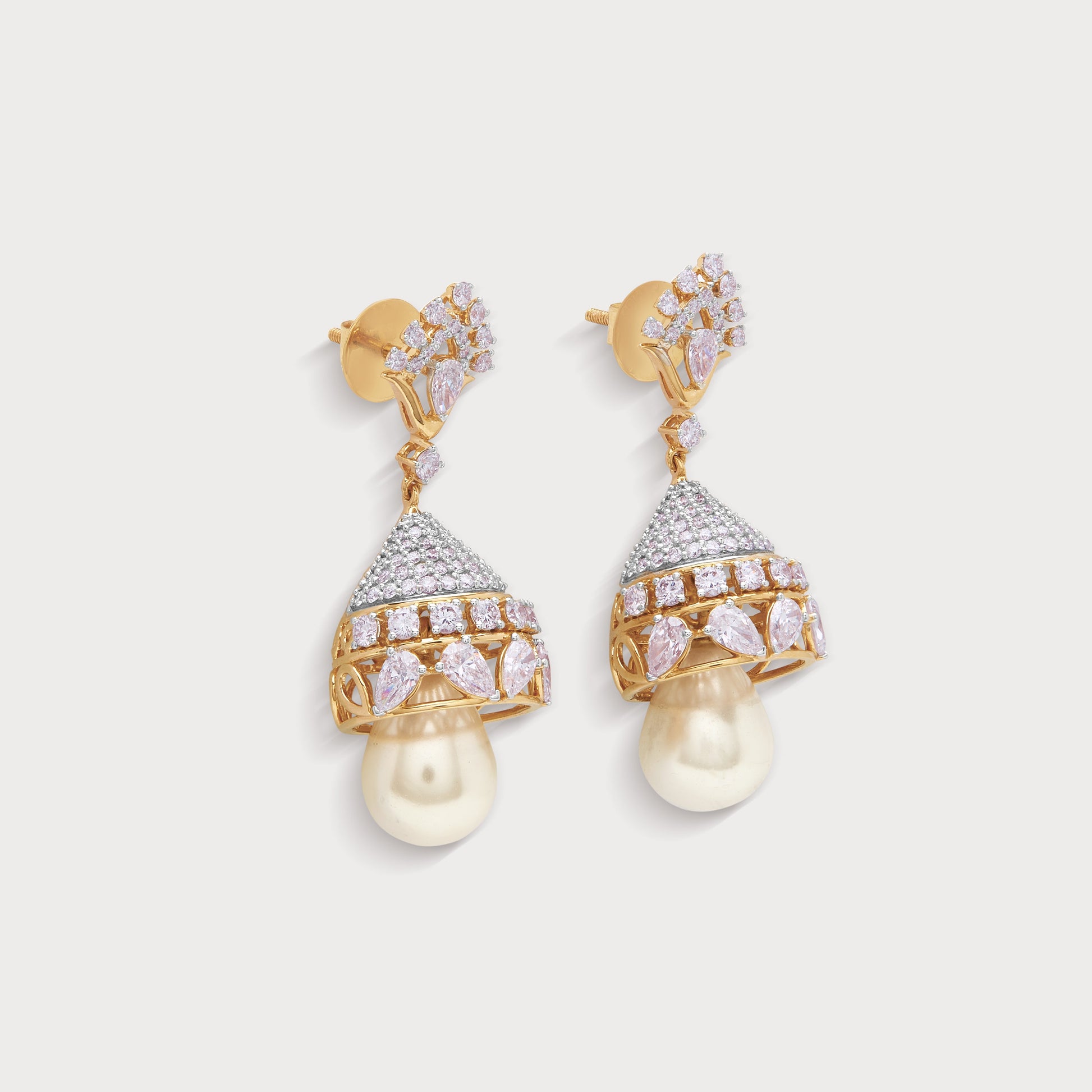 Chandini Jhumkas: Gold and diamond jhumka earrings with pearl drops. Elegant traditional Indian diamond jewelry for women.