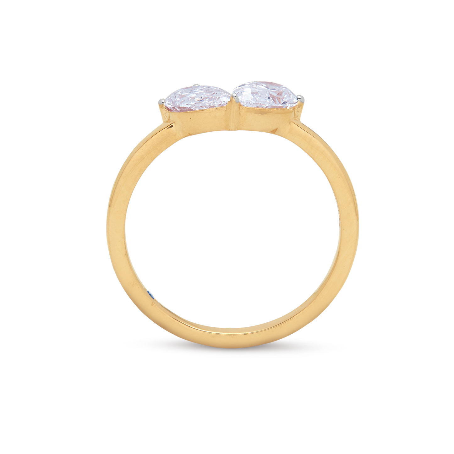 The Twin Pear Ring, a yellow gold ring featuring two sparkling pear-shaped diamonds, perfect for diamond jewelry and engagement rings.