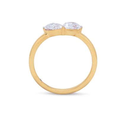 The Twin Pear Ring, a yellow gold ring featuring two sparkling pear-shaped diamonds, perfect for diamond jewelry and engagement rings.