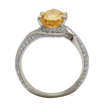 The Champagne Wave Pear Ring, a luxurious diamond ring featuring a pear-cut champagne diamond centerpiece and a unique wave-shaped band adorned with brilliant pave diamonds. Ideal for special occasions and fine diamond jewelry collections.