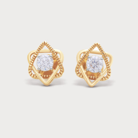 The Gold Star Loop Studs. Pair of gold stud earrings with a star-shaped loop design, featuring a central round brilliant cut diamond and intricate milgrain detailing. Diamond jewelry for women.