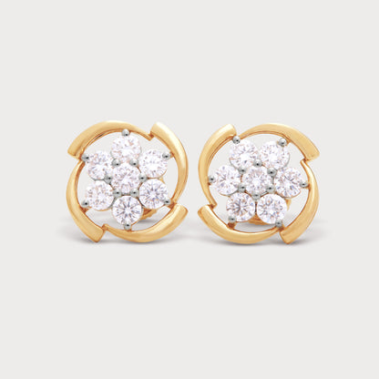 The Chakra Flower Studs: A pair of yellow gold diamond stud earrings with a floral cluster design, perfect for fine diamond jewellery collections.