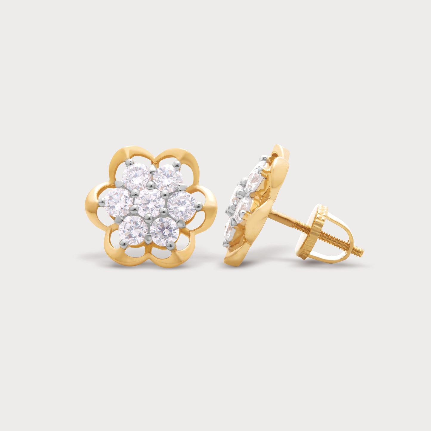 Golden Fig Studs: Elegant gold diamond earrings with a fig-shaped floral design, perfect for diamond jewellery shopping.