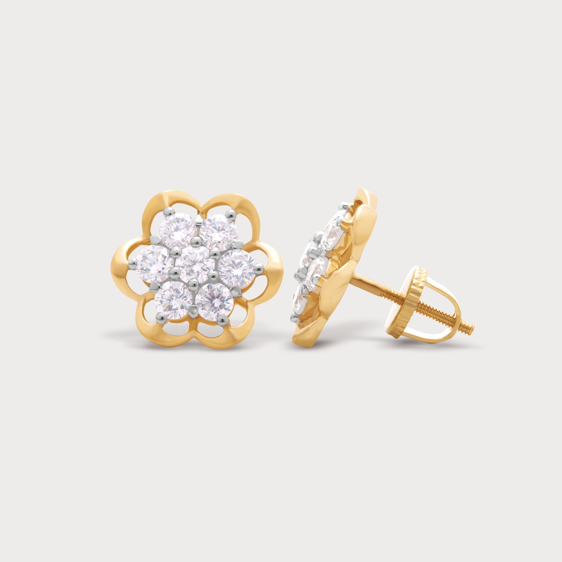 Golden Fig Studs: Elegant gold diamond earrings with a fig-shaped floral design, perfect for diamond jewellery shopping.