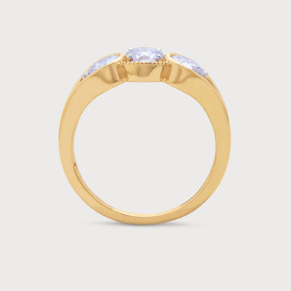 The Trilogy Ring, a gold ring with three round diamonds, perfect for an e-commerce jewelry store.