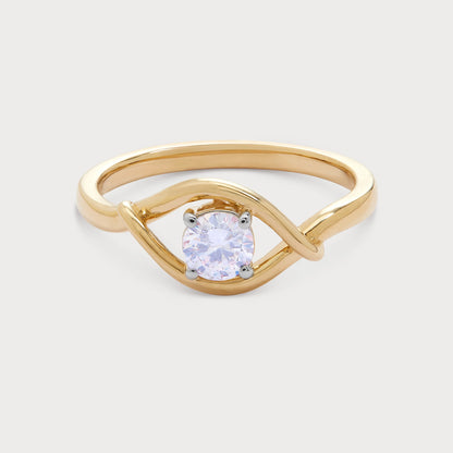 The Enso Ring: Gold diamond solitaire ring with a unique twisted band design.