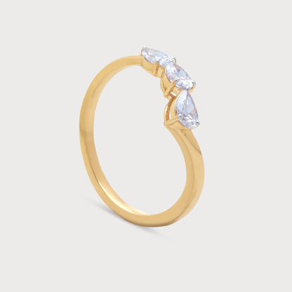 The Radiant Ring: Stunning gold ring featuring three dazzling pear-shaped diamonds, perfect for engagement, wedding, or anniversary from our fine diamond jewelry collection.