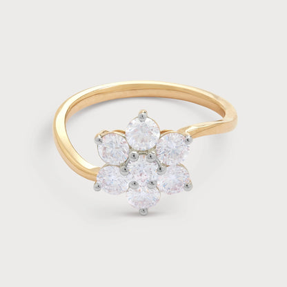The Bloom Ring: Elegant gold diamond ring featuring a seven-stone floral cluster design, perfect for engagements or as a statement fashion ring.