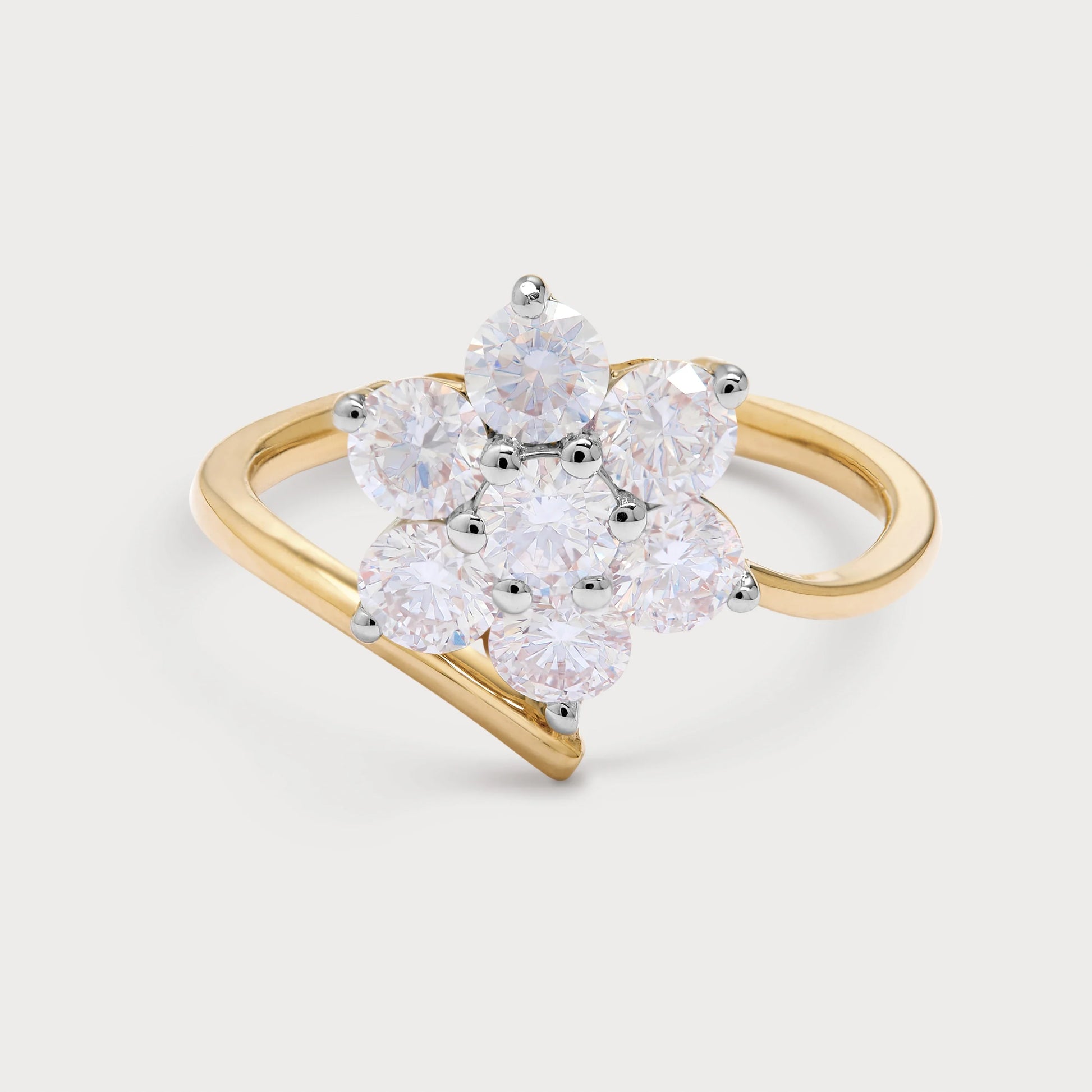 The Solara Ring - elegant gold diamond flower cluster ring featuring seven round brilliant diamonds, ideal for engagement or anniversary.