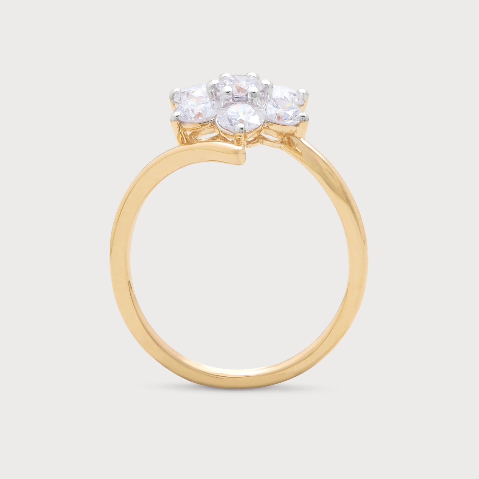 The Solara Ring: An elegant yellow gold diamond cluster ring featuring five brilliant-cut diamonds, perfect for engagements or as a luxury diamond jewelry piece.