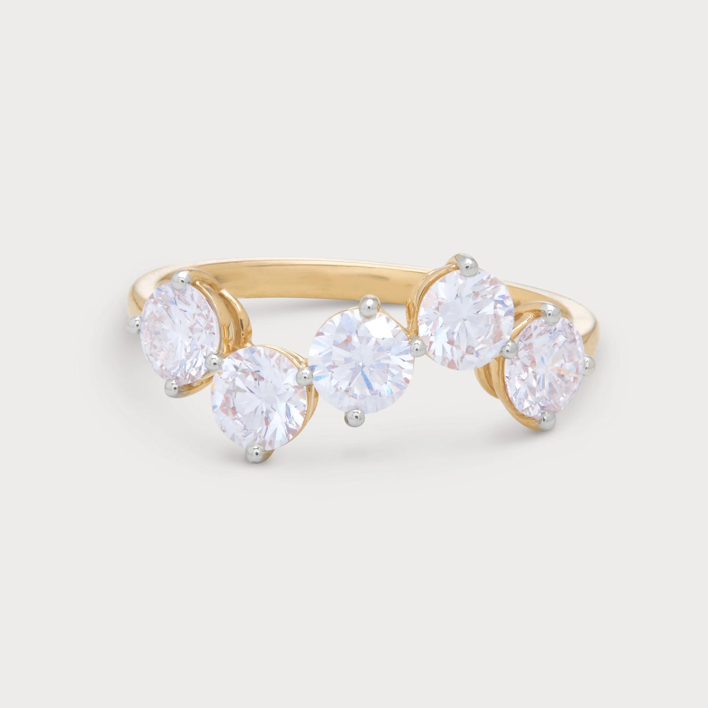 The Aster Ring, a stunning gold diamond ring with five brilliant round diamonds, perfect for an elegant jewellery collection.