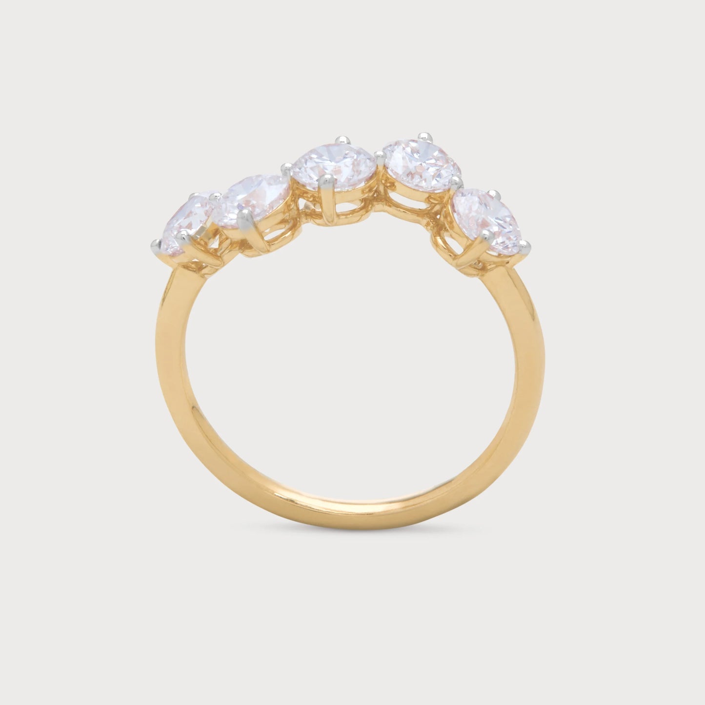 The Aster Ring: Gold diamond ring with five brilliant round-cut diamonds, perfect for engagement, wedding, or anniversary. Fine diamond jewelry.