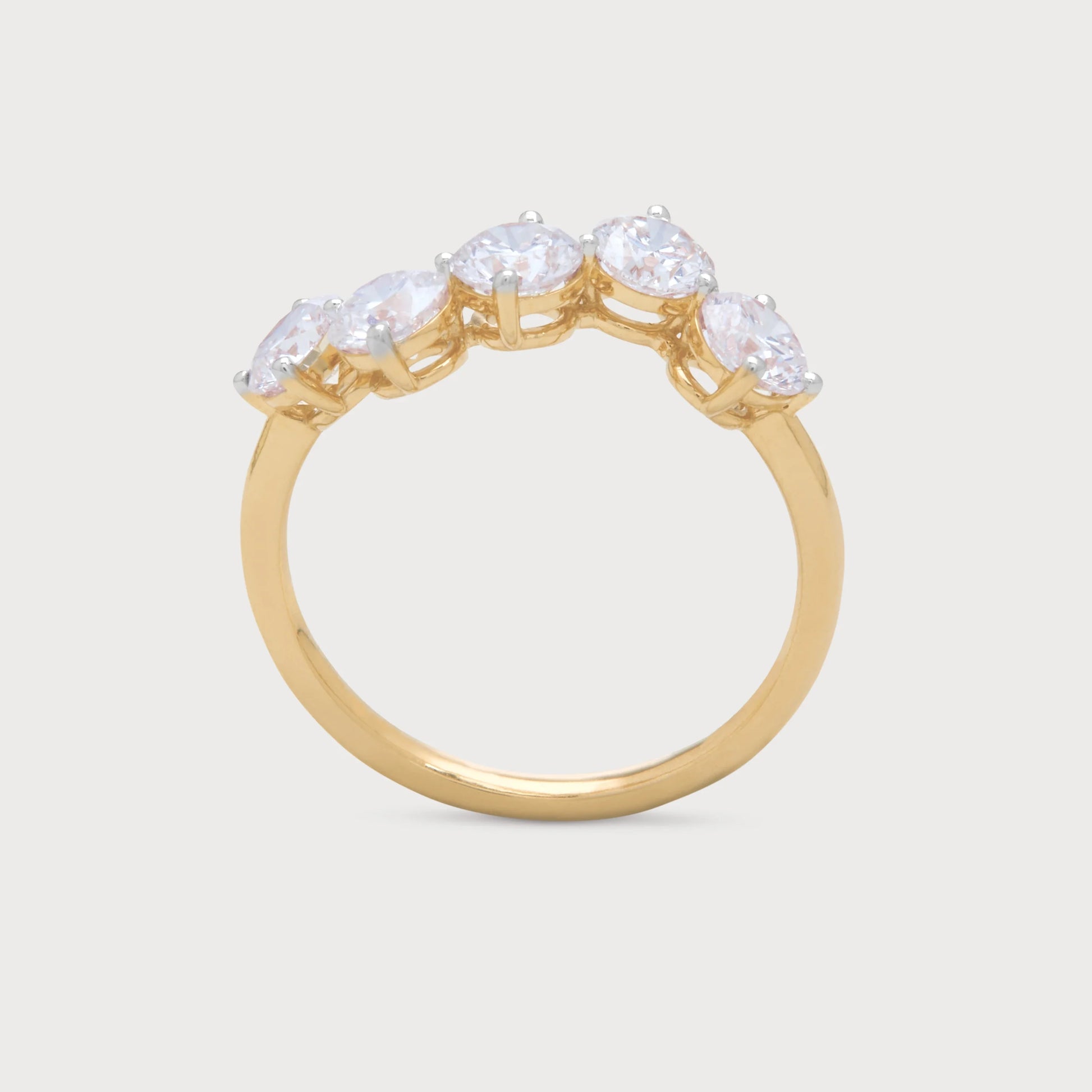 The Aster Ring: Gold diamond ring with five brilliant round-cut diamonds, perfect for engagement, wedding, or anniversary. Fine diamond jewelry.
