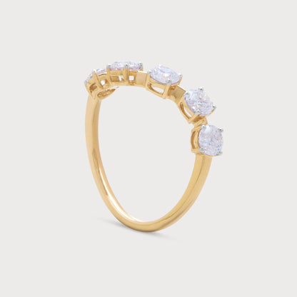 The Vela Ring, a stunning gold five-stone diamond ring, ideal for engagement, anniversary, or a luxurious gift. High-quality diamond jewelry for women.