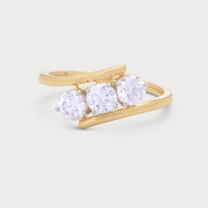 The Selara Ring - Elegant gold three-stone diamond ring, perfect for engagement or anniversary, featuring a unique bypass band design from our diamond jewelry collection.