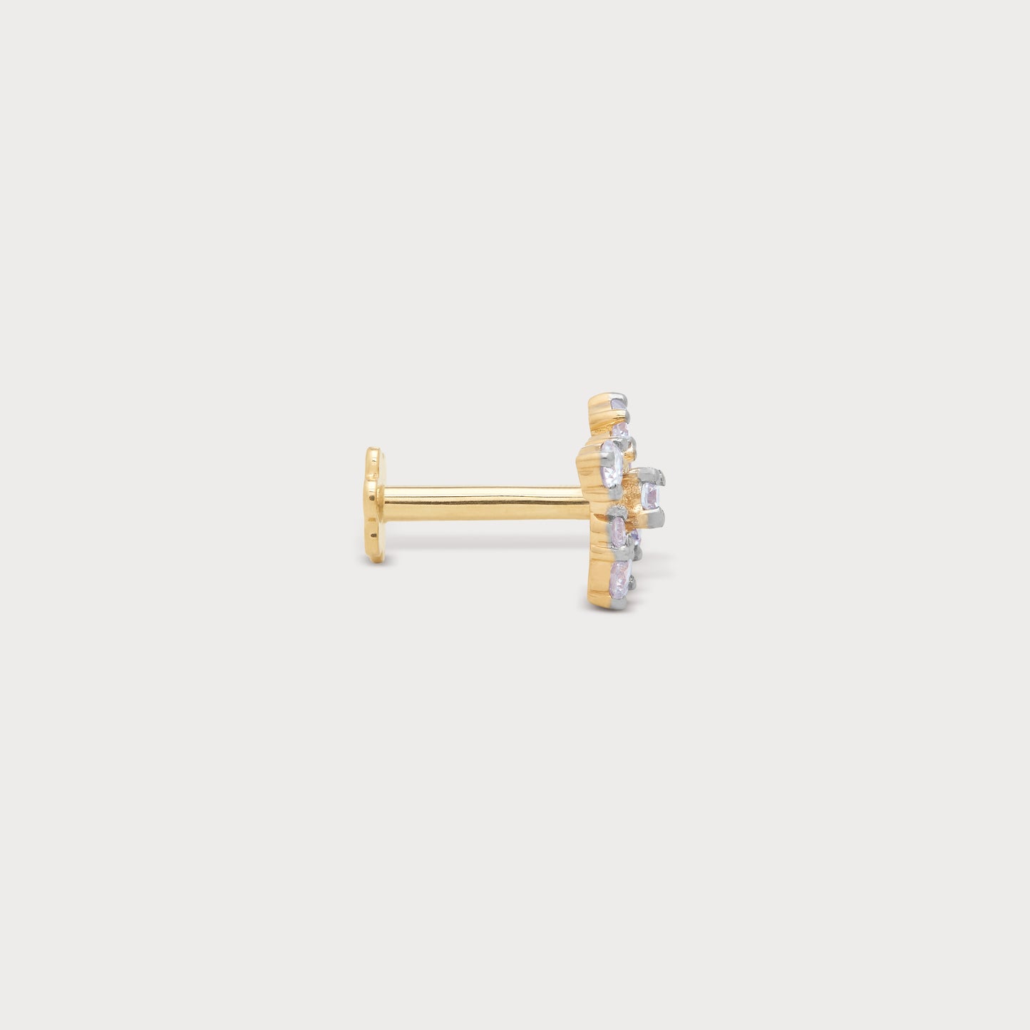 The Sparkle Cluster Nose Pin, a gold diamond nose pin for women, from a diamond jewellery store.