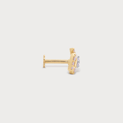 The Triad Spark Nose Pin, a stunning gold diamond nose pin featuring pink and white diamonds, perfect for elegant jewellery collections and everyday wear.