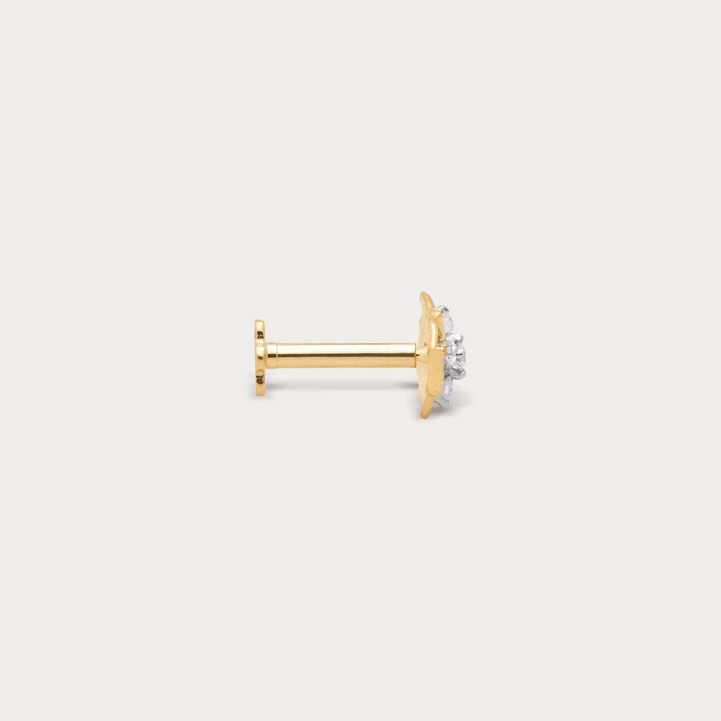 The Quadrant Nose Pin in gold with sparkling diamonds, perfect for diamond jewellery enthusiasts. Shop this exquisite nose stud online.