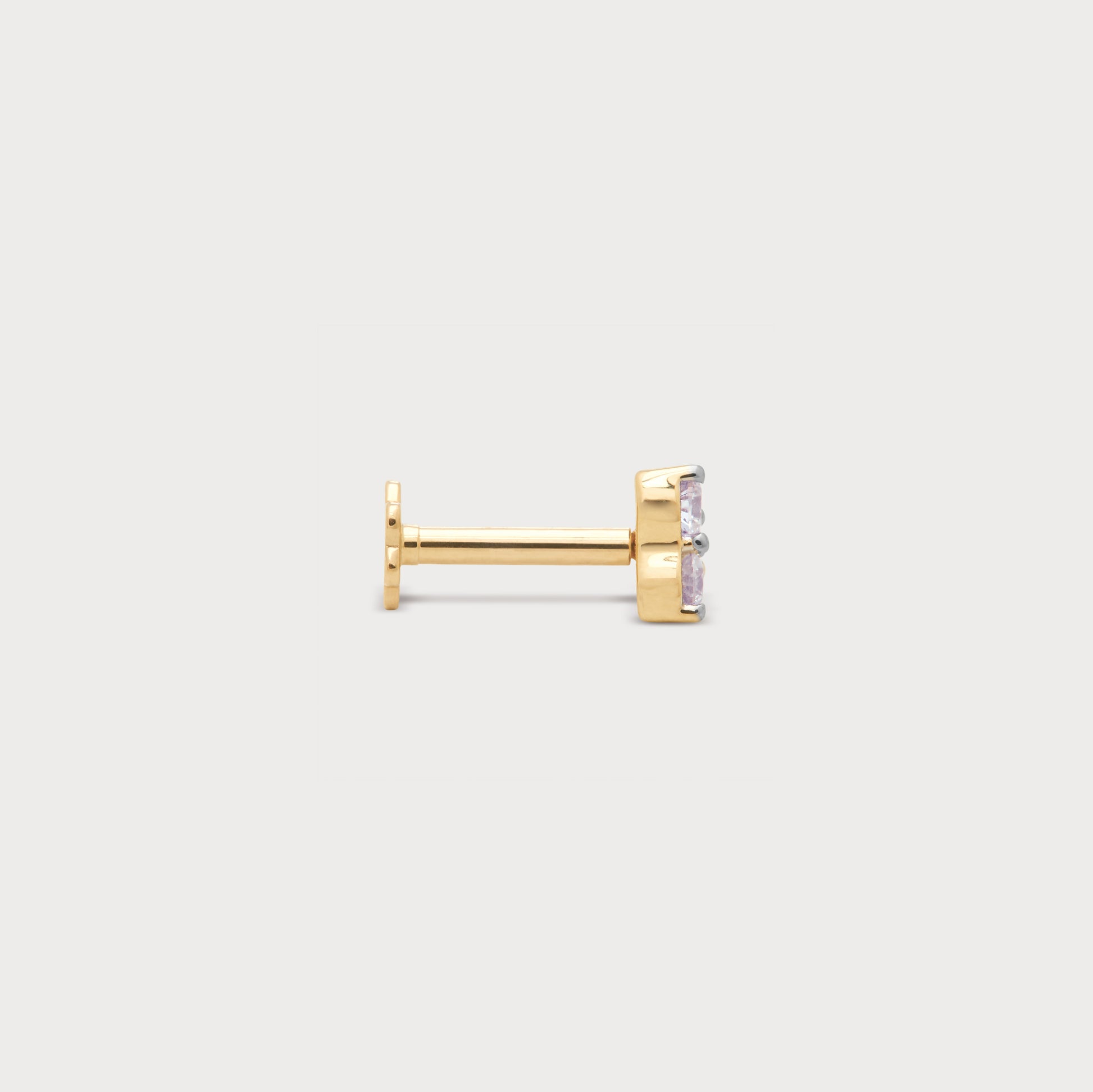 Yellow gold labret piercing with a rectangular light pink diamond, a luxurious piece of diamond jewelry perfect for ear or lip piercings.