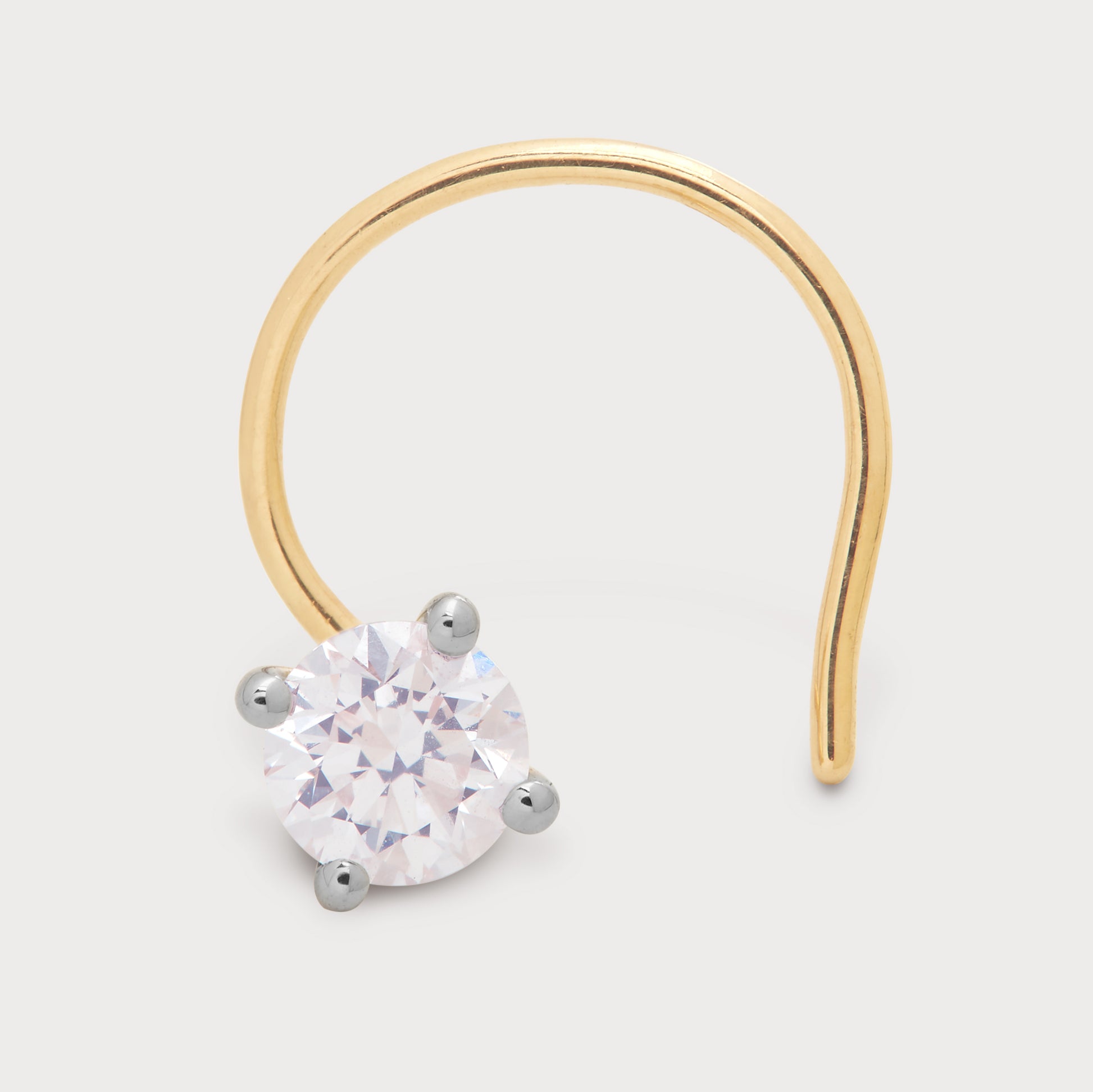 The Radiant Solitary Nose Pin - elegant gold nose pin with a brilliant solitaire diamond. Shop exquisite diamond nose jewelry for women.